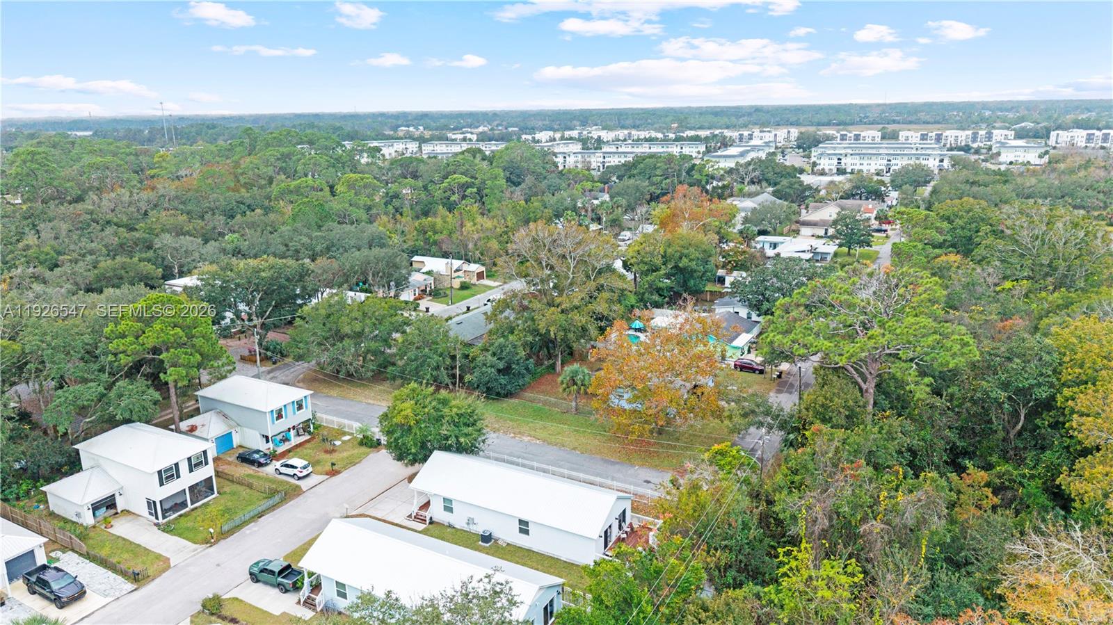 2 Poinciana Cove Road St. Augustine, FL 32084 - Photo 39 of 43 a view of a city with lush green forest