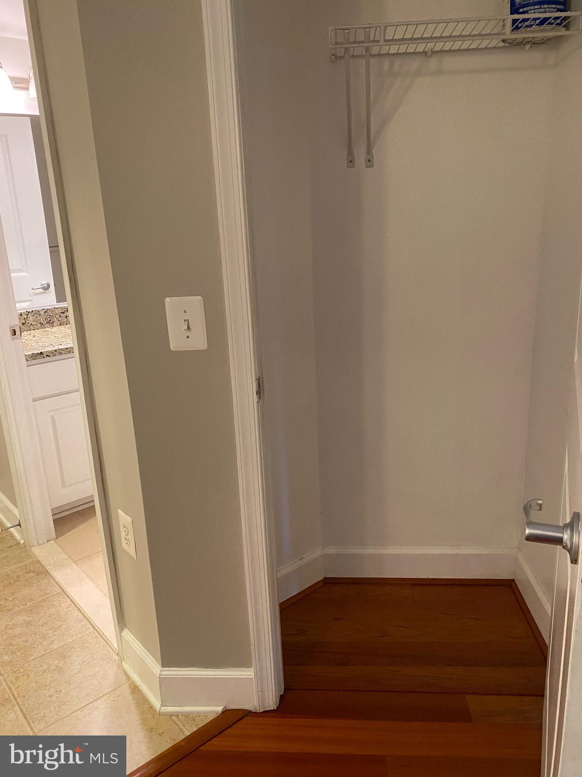 11800 Sunset Hills Road, Unit 313 Reston, VA 20190 - Photo 10 of 60 Coat closet at foyer