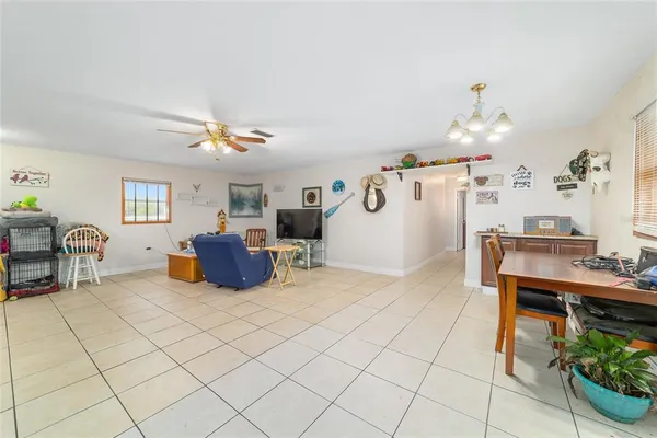 a view of a workspace with furniture and a livingroom