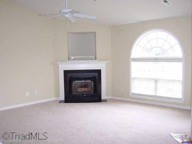 133 James Road, Unit 3C High Point, NC 27265 - Photo 3 of 9 Other. Huge living room with built-in bookcases, t.v. niche, large window and gas logs. Pass through bar in kitchen makes it great for entertaining!