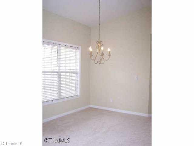 133 James Road, Unit 3C High Point, NC 27265 - Photo 5 of 9 Other. Charming dining area by a window.