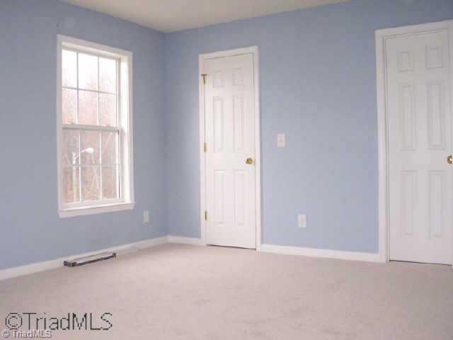 133 James Road, Unit 3C High Point, NC 27265 - Photo 6 of 9 Other. Large master bedroom with lots of windows. Master bathroom has a walk-in shower with a seat.