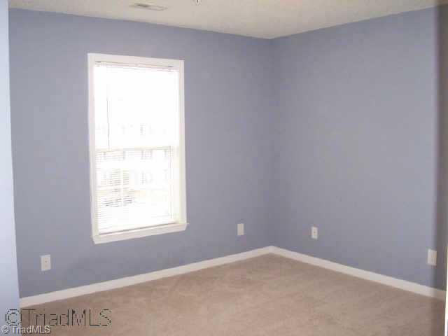 133 James Road, Unit 3C High Point, NC 27265 - Photo 7 of 9 Other. Spacious guest bedroom or home office with french doors