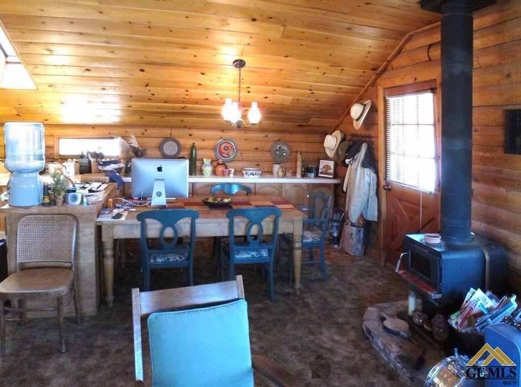 Undisclosed Address Caliente, CA 93518 - Photo 12 of 14 a view of a chairs and tables in the back yard of a building