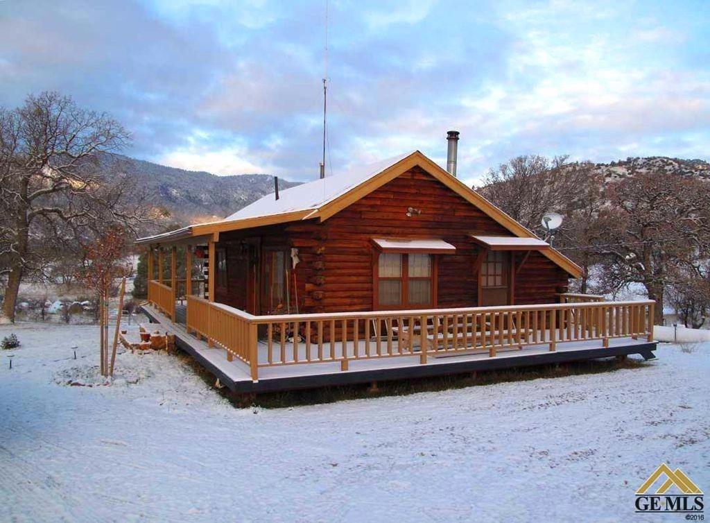 Undisclosed Address Caliente, CA 93518 - Photo 2 of 14 a front view of a house with wooden fence