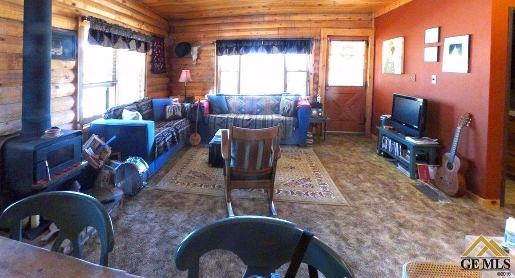 Undisclosed Address Caliente, CA 93518 - Photo 9 of 14 a living room with furniture and a flat screen tv