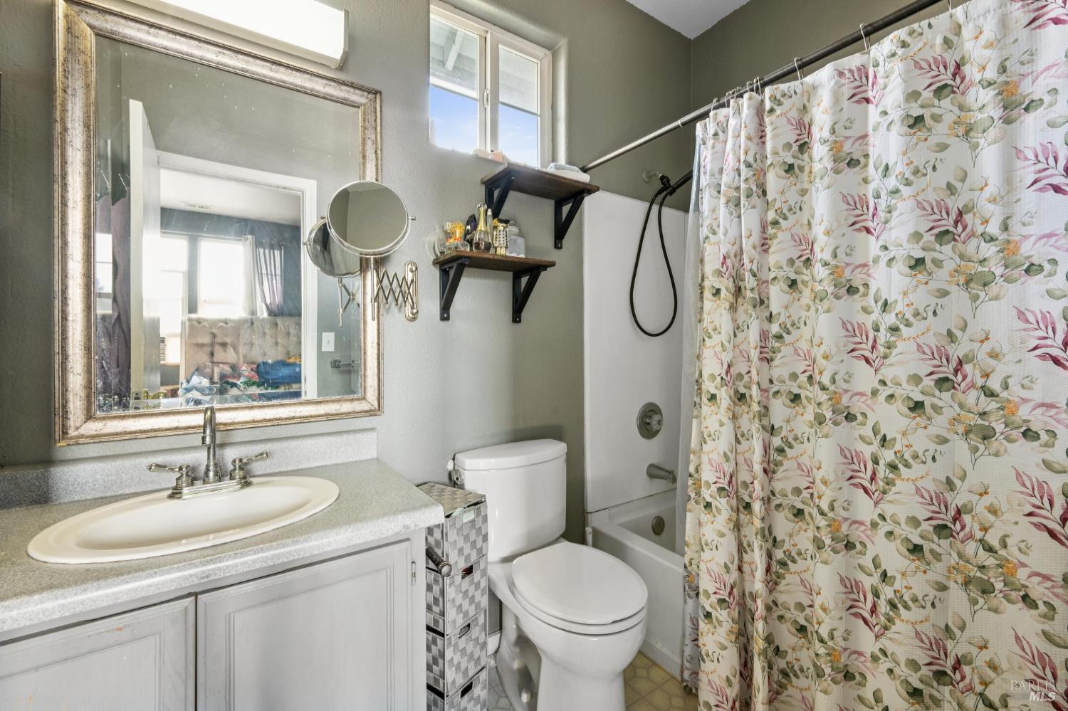1507 Pinebrook Place Santa Rosa, CA 95403 - Photo 11 of 15 a bathroom with a sink toilet and shower