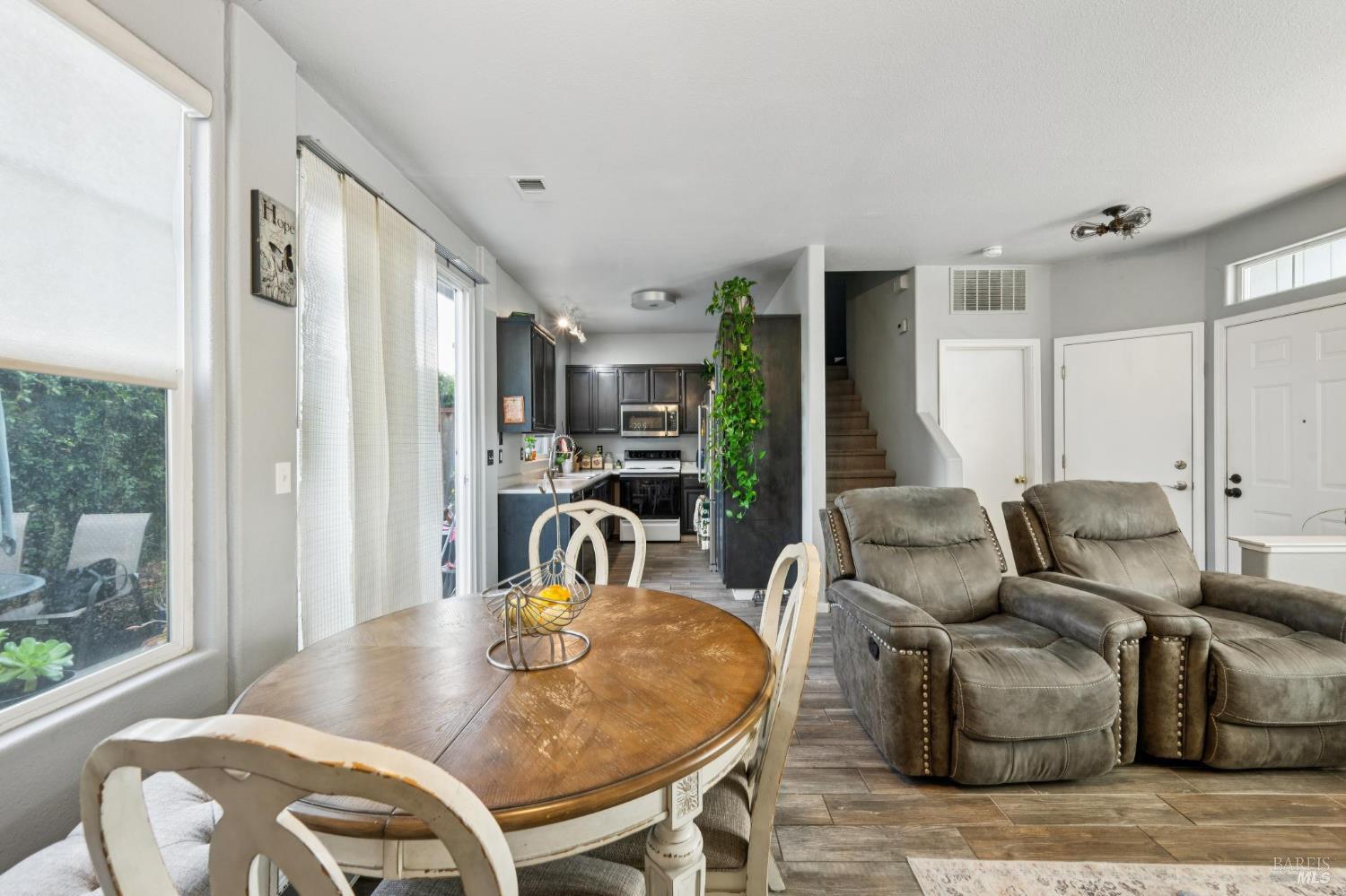 1507 Pinebrook Place Santa Rosa, CA 95403 - Photo 5 of 15 a living room with furniture a large window and wooden floor