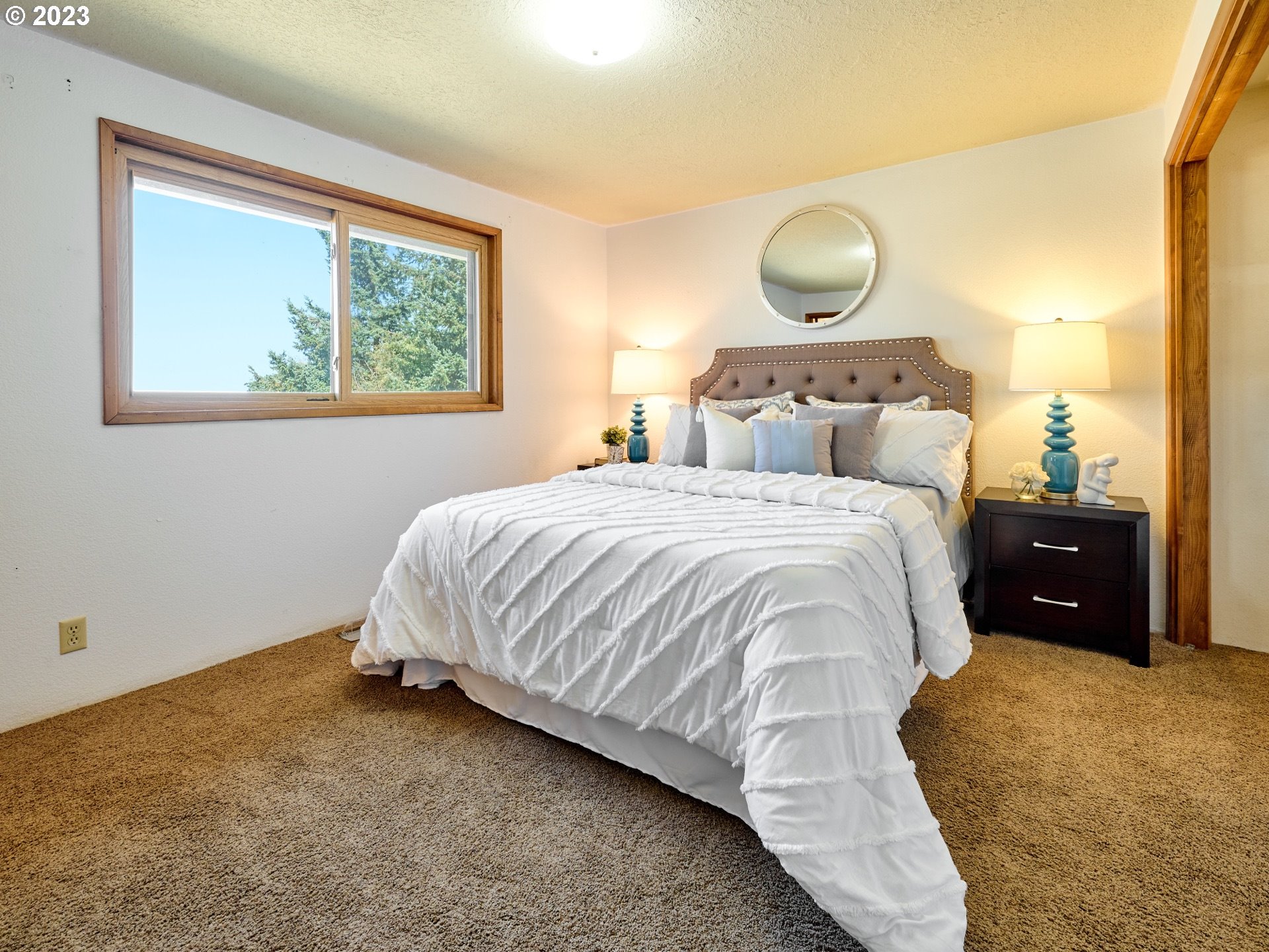 3661 Seminole Road Northeast Silverton, OR 97381 - Photo 15 of 48 a bedroom with a bed and window