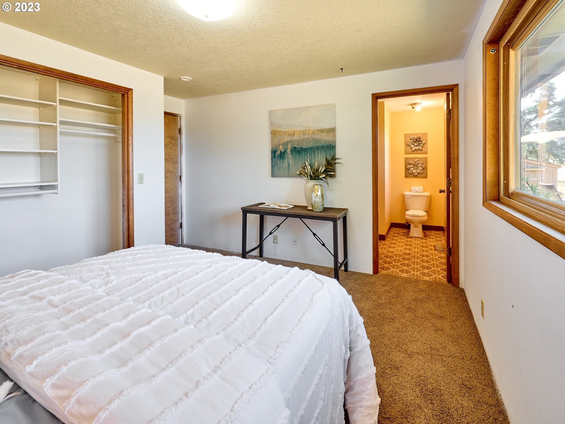 3661 Seminole Road Northeast Silverton, OR 97381 - Photo 17 of 48 a bedroom with a bed and a large window