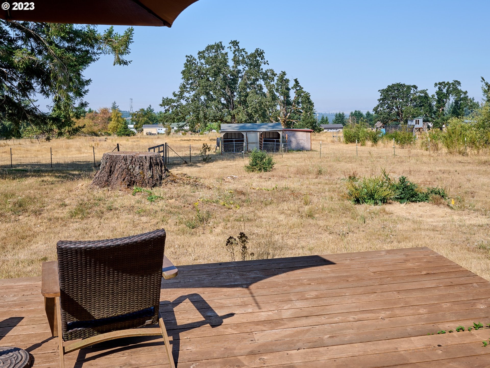 3661 Seminole Road Northeast Silverton, OR 97381 - Photo 34 of 48 a view of a chairs and table on the wooden floor