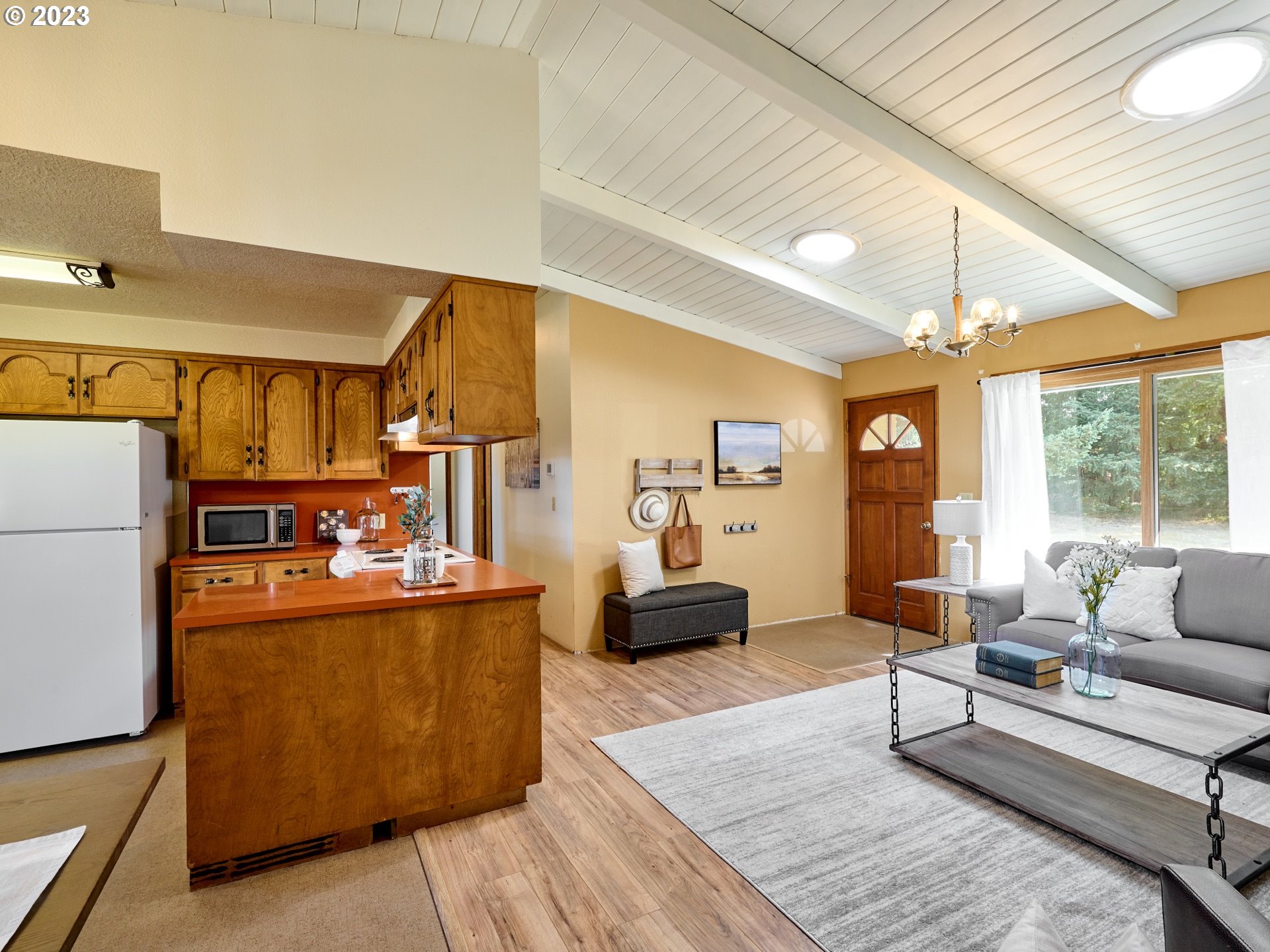 3661 Seminole Road Northeast Silverton, OR 97381 - Photo 4 of 48 a living room with furniture and a large window