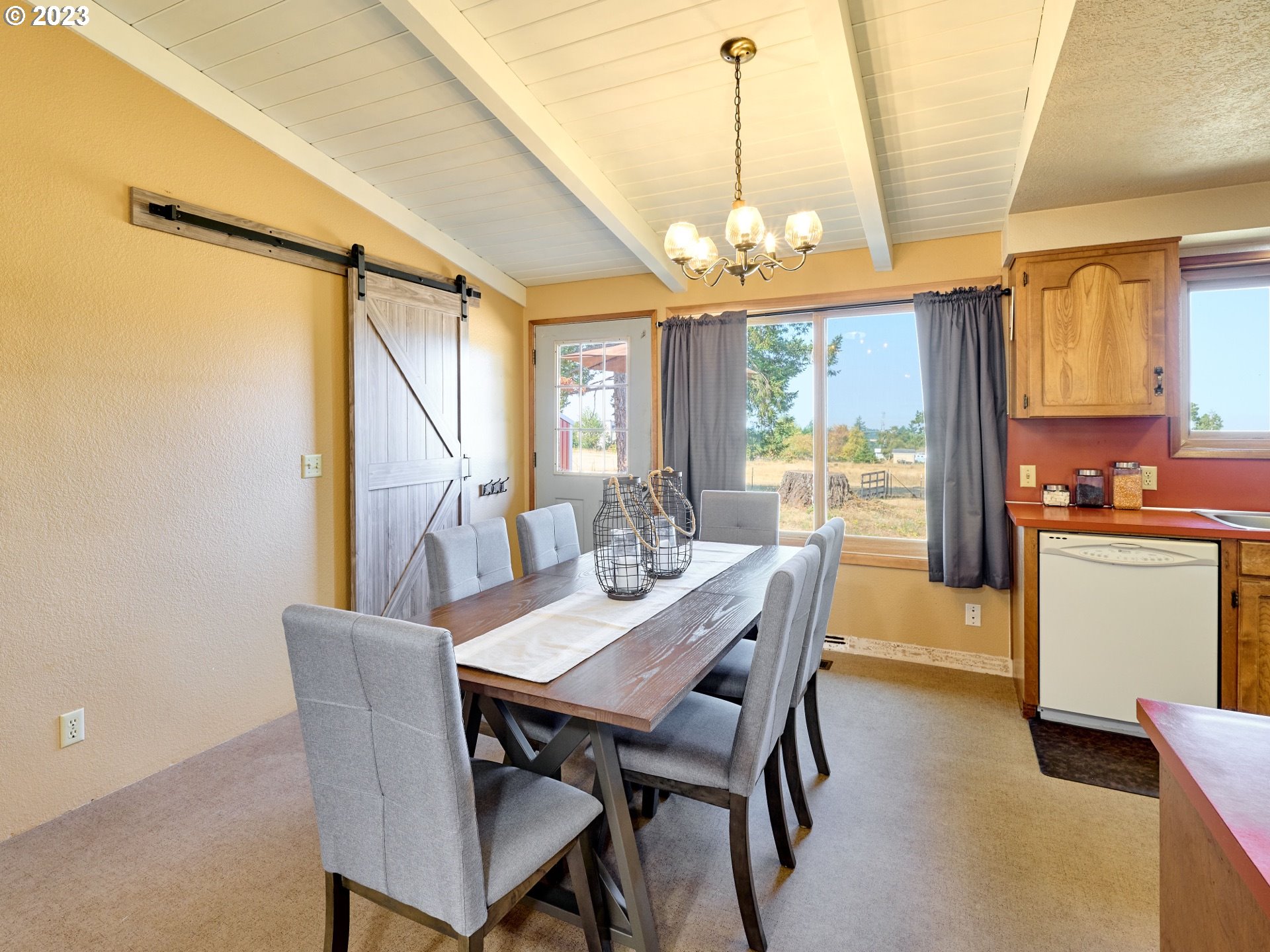 3661 Seminole Road Northeast Silverton, OR 97381 - Photo 9 of 48 a view of a dining room with furniture window and outside view