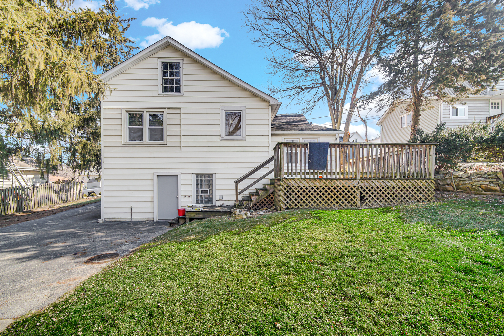 716 Chestnut Street Lemont, IL 60439 - Photo 17 of 20 a view of a house with a small yard