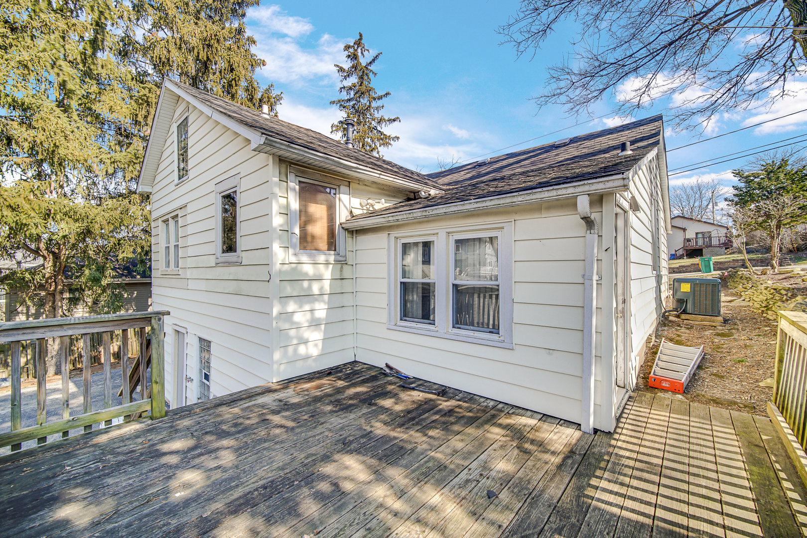 716 Chestnut Street Lemont, IL 60439 - Photo 19 of 20 a view of a house with a wooden deck