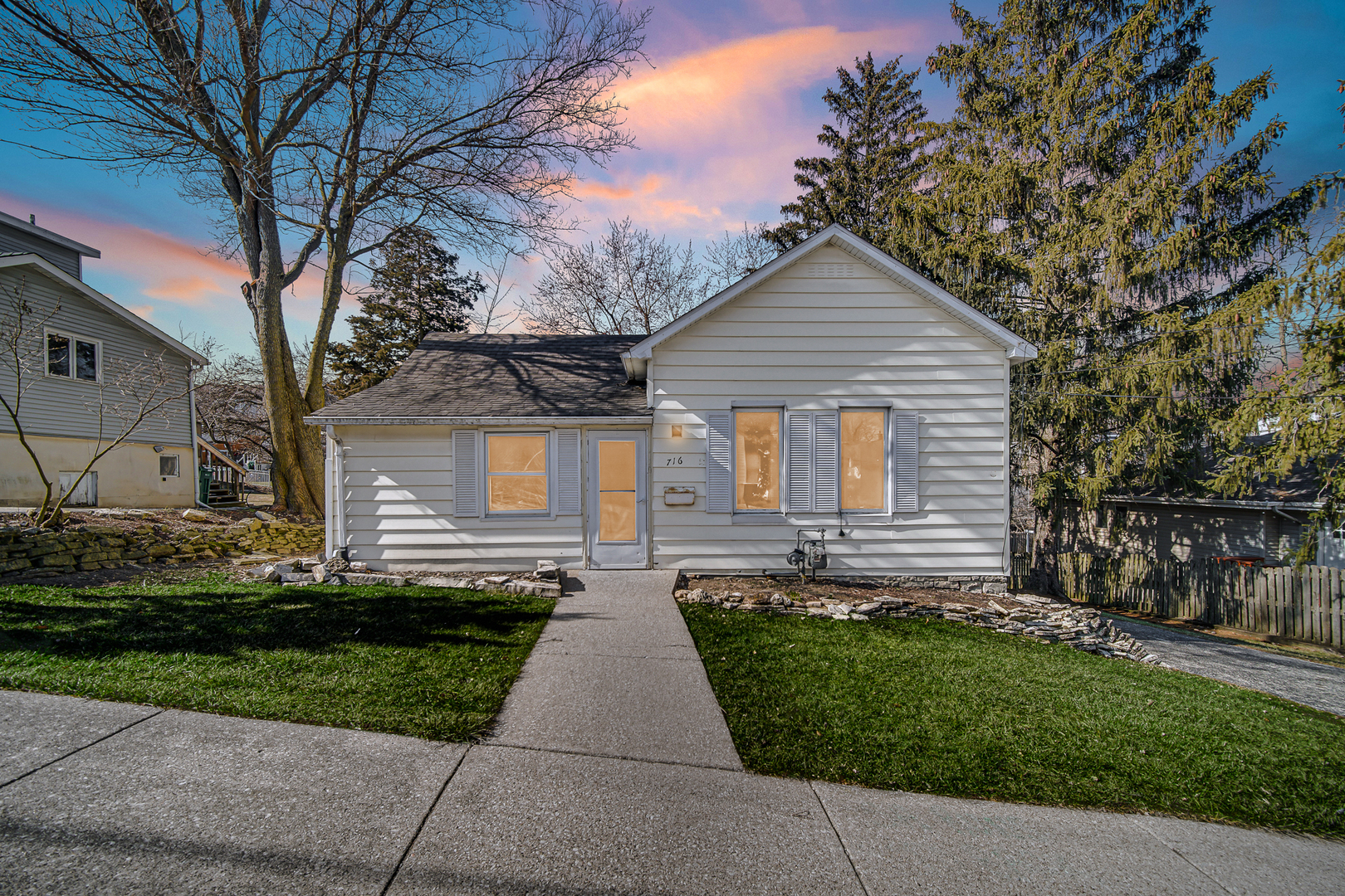 716 Chestnut Street Lemont, IL 60439 - Photo 20 of 20 a front view of a house with a yard