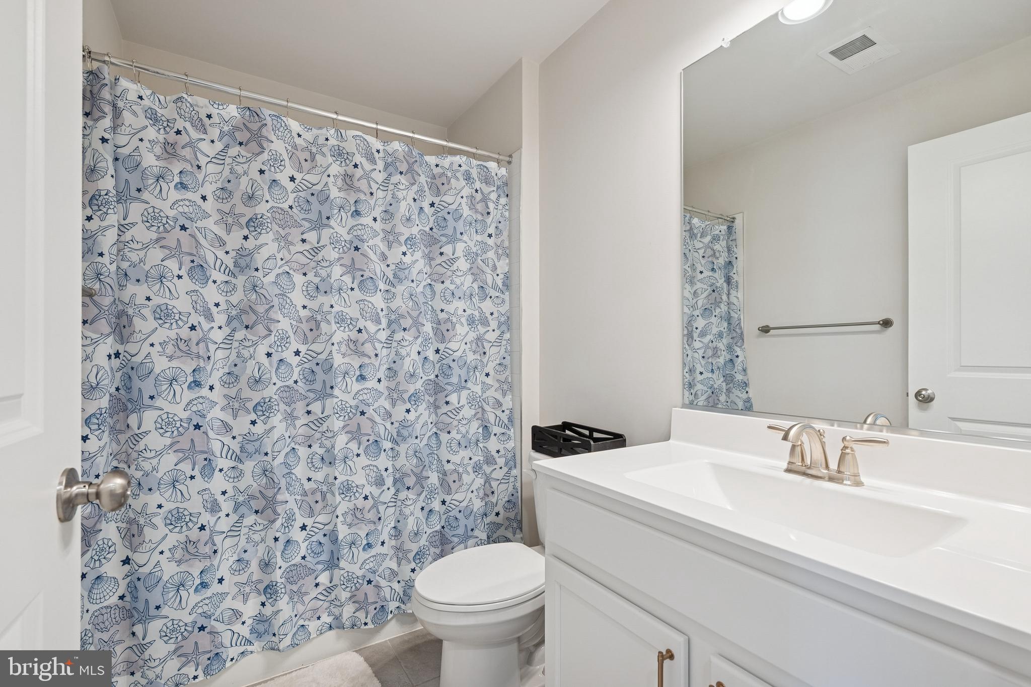 12 Palermo Ln Mount Mount Laurel, NJ 08054 - Photo 17 of 25 a bathroom with a sink toilet and a mirror