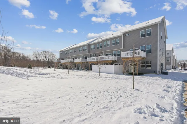a view of a backyard with a patio