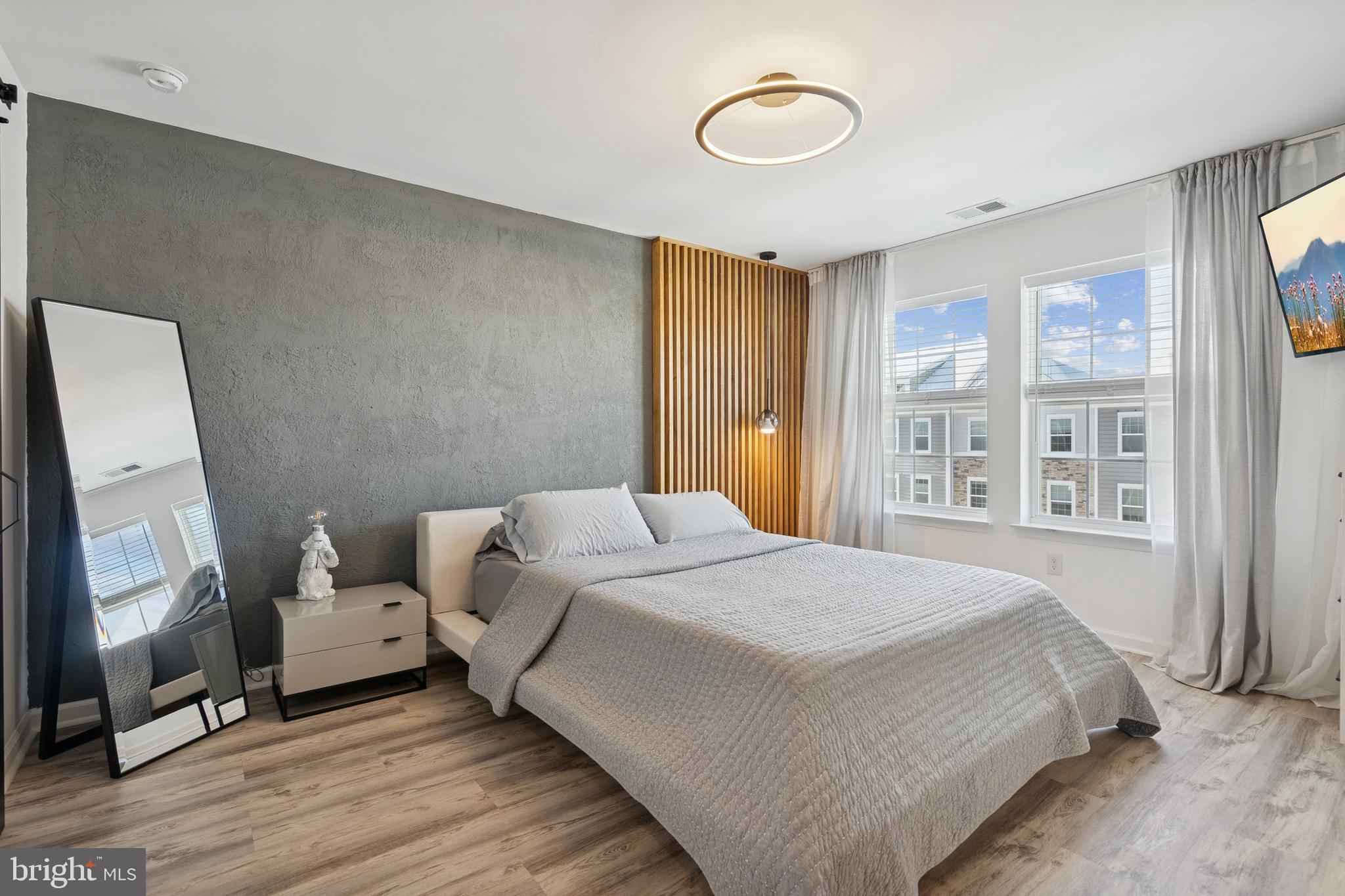 12 Palermo Ln Mount Mount Laurel, NJ 08054 - Photo 9 of 25 a bedroom with a bed a mirror and a window