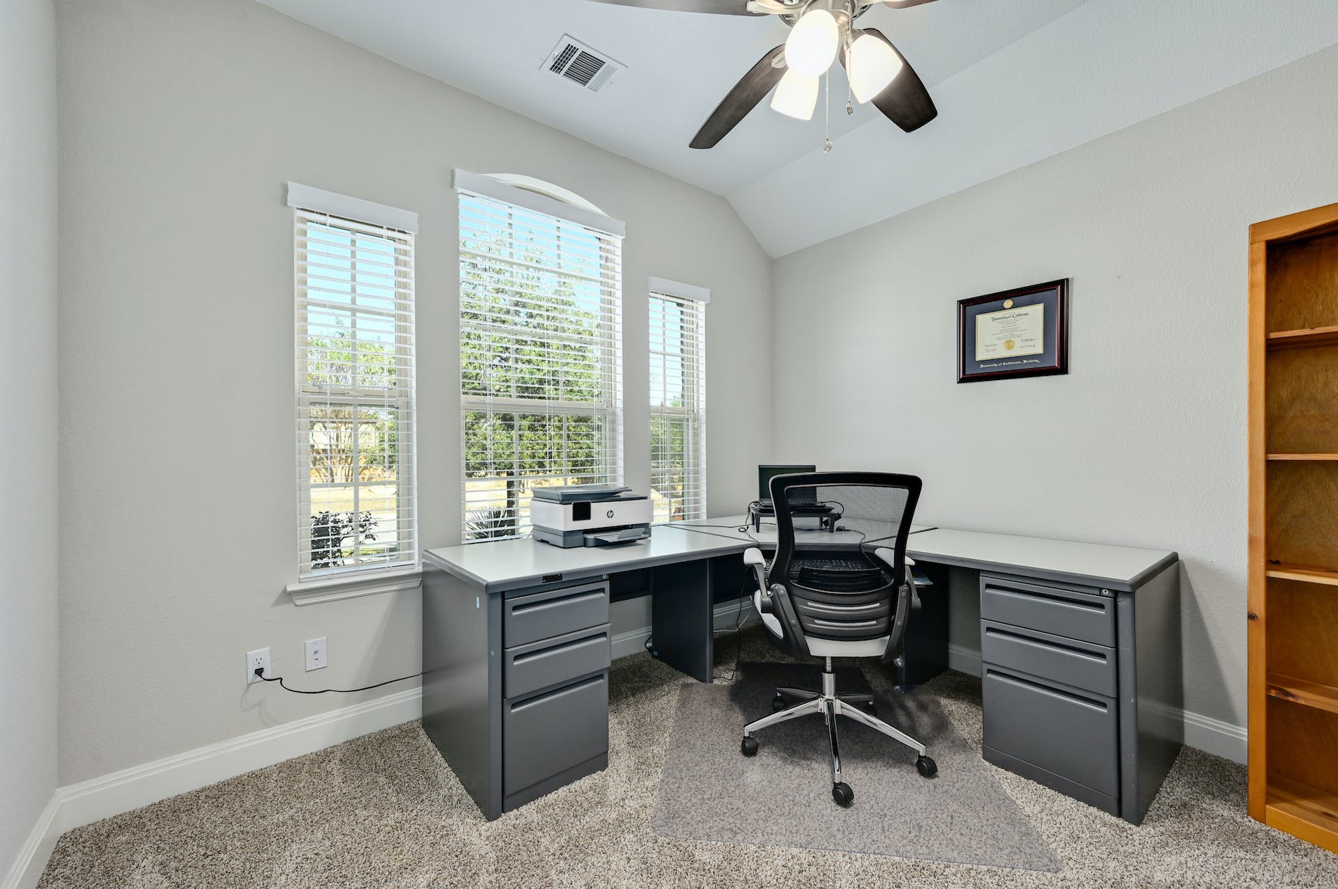 5805 Buchanan Draw Road Austin, TX 78738 - Photo 21 of 39 a view of a workspace with furniture and a window