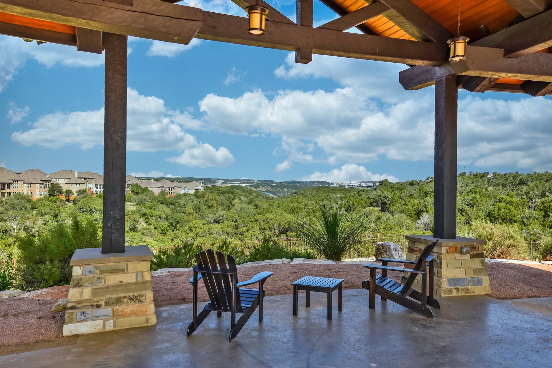 5805 Buchanan Draw Road Austin, TX 78738 - Photo 32 of 39 a view of a chairs and table in the patio