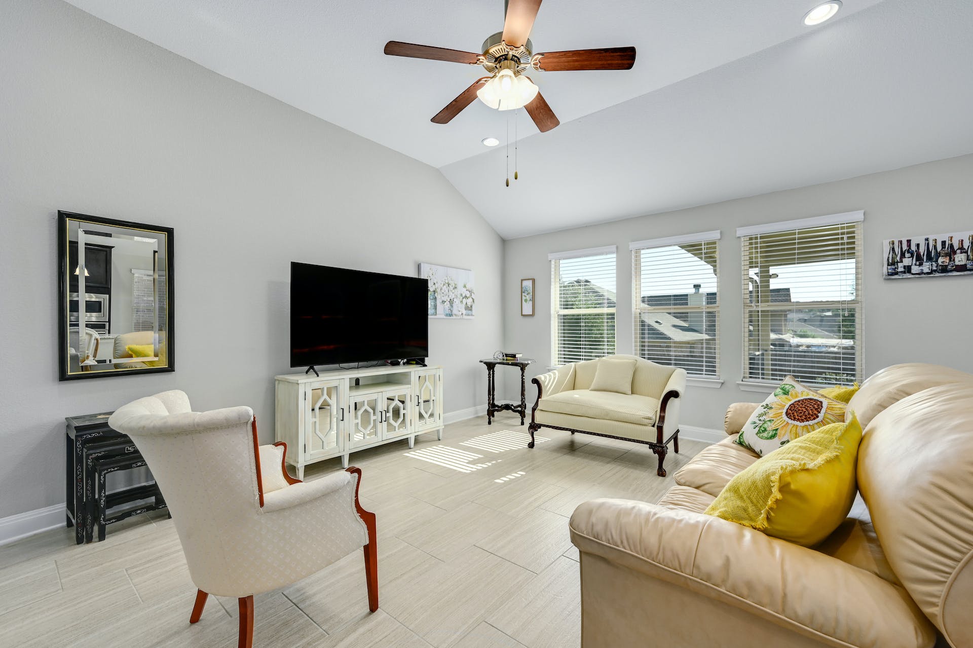 5805 Buchanan Draw Road Austin, TX 78738 - Photo 6 of 39 a living room with furniture and a flat screen tv