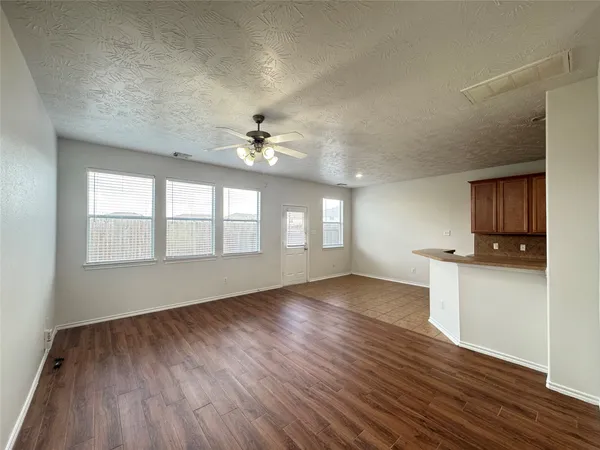 a view of an empty room and window