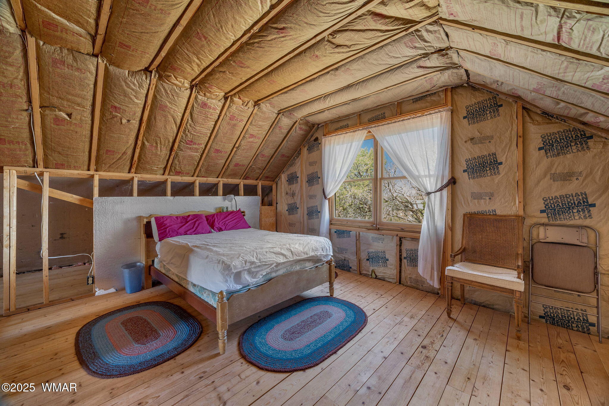 4 County Road Concho, AZ 85924 - Photo 11 of 25 a bedroom with bunk bed and a window