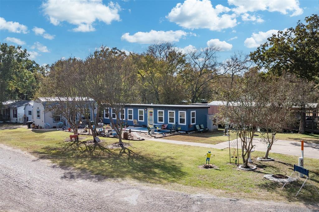 205 Scott Lane Mabank, TX 75156 - Photo 1 of 21 a view of a house with backyard and sitting area