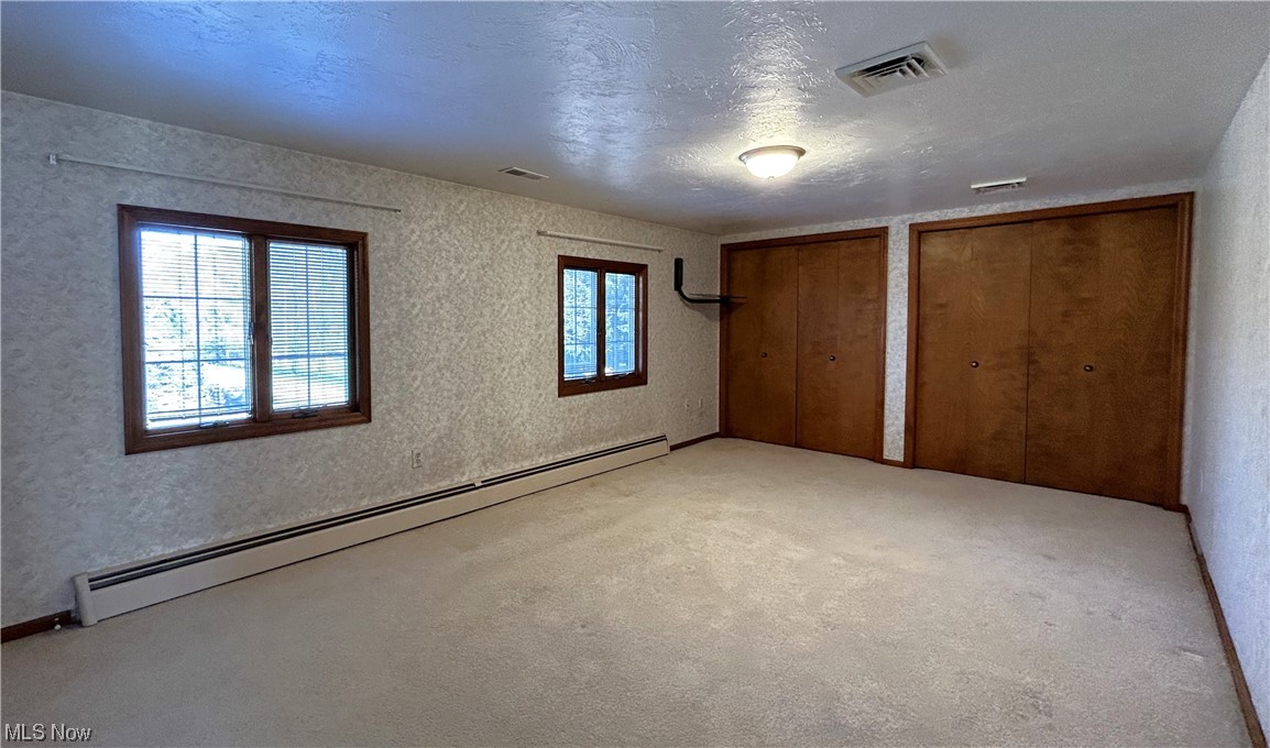 7855 Mulberry Road Chesterland, OH 44026 - Photo 24 of 46 Master bedroom featuring two large closets, and a 3rd closet for additional storage.