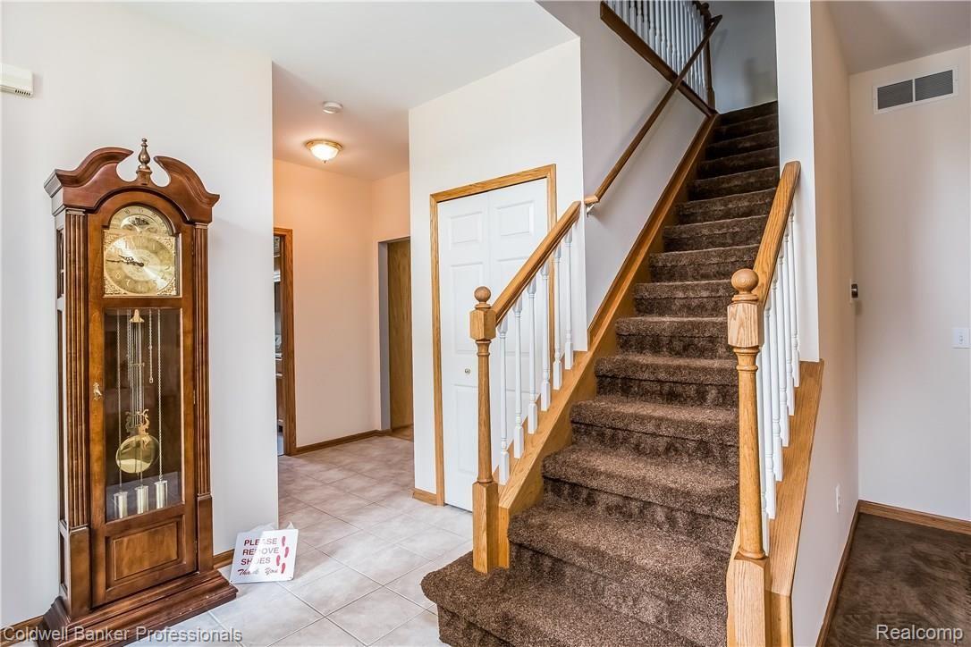 8483 Lee Road Brighton, MI 48116 - Photo 9 of 41 010-Living_Room-2908848-large.jpg