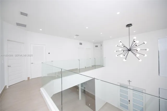 a very nice looking room with a ceiling fan