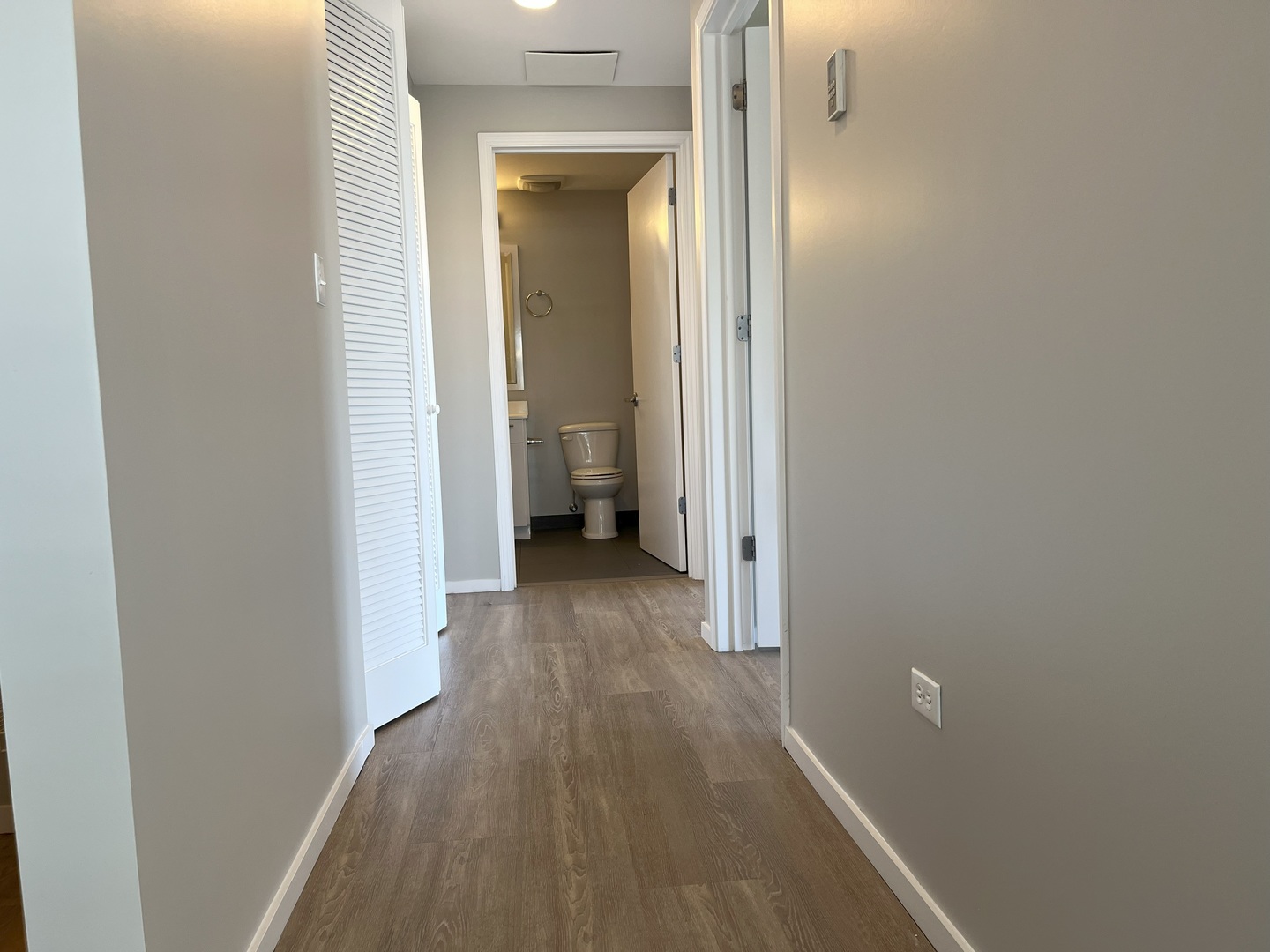 211 West Scott Street, Unit 508 Chicago, IL 60610 - Photo 12 of 22 a view of a room with wooden floor