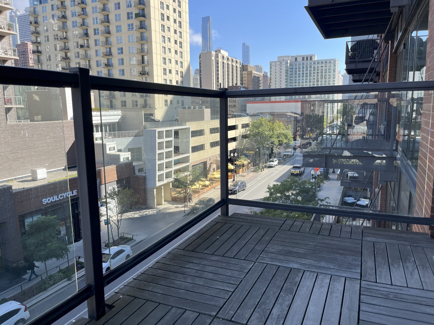211 West Scott Street, Unit 508 Chicago, IL 60610 - Photo 13 of 22 a view of a balcony with wooden floor