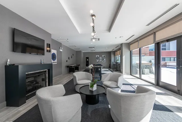 a outdoor space with patio couches and a potted plant