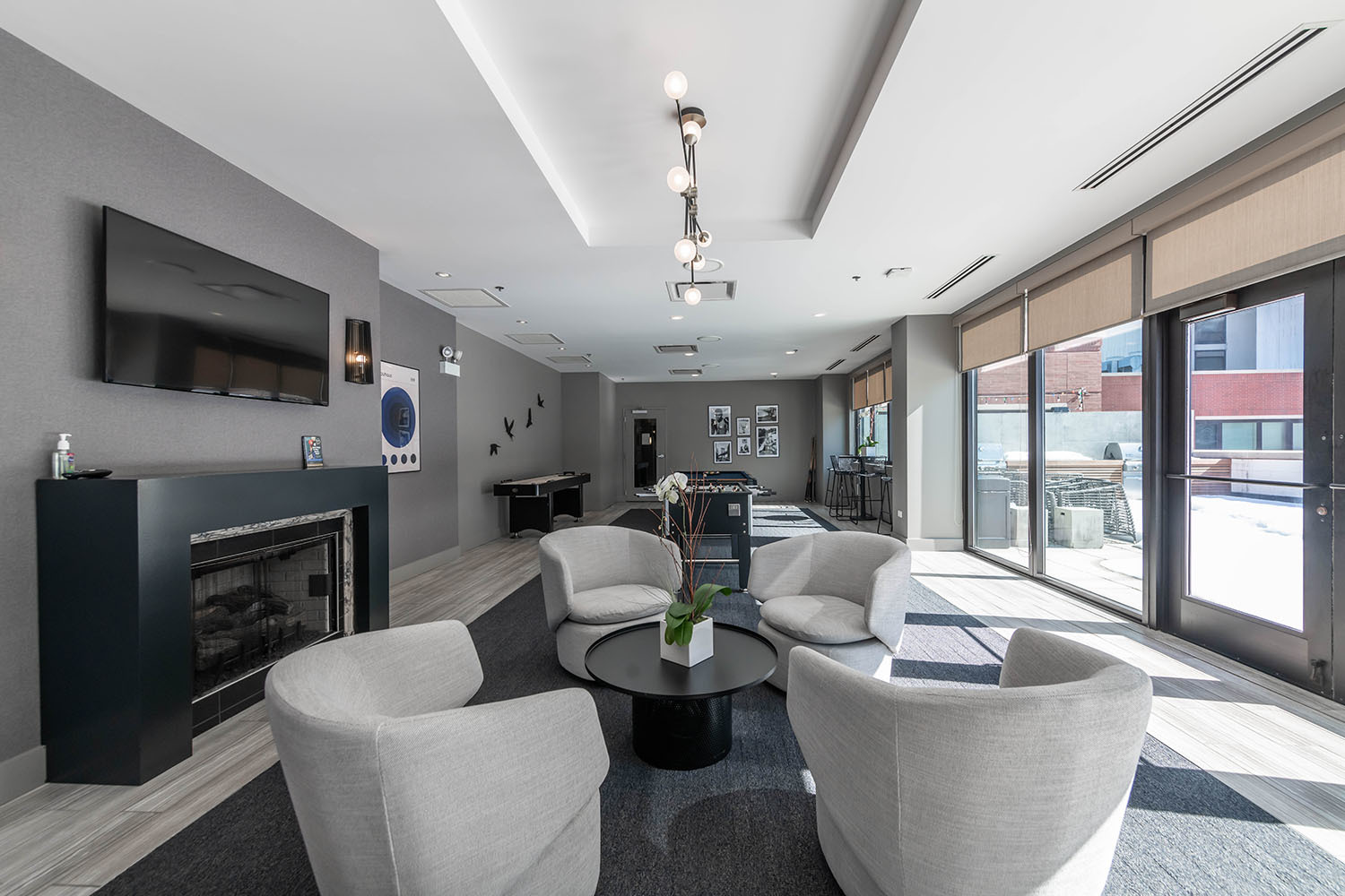 211 West Scott Street, Unit 508 Chicago, IL 60610 - Photo 16 of 22 a living room with fireplace furniture and a flat screen tv