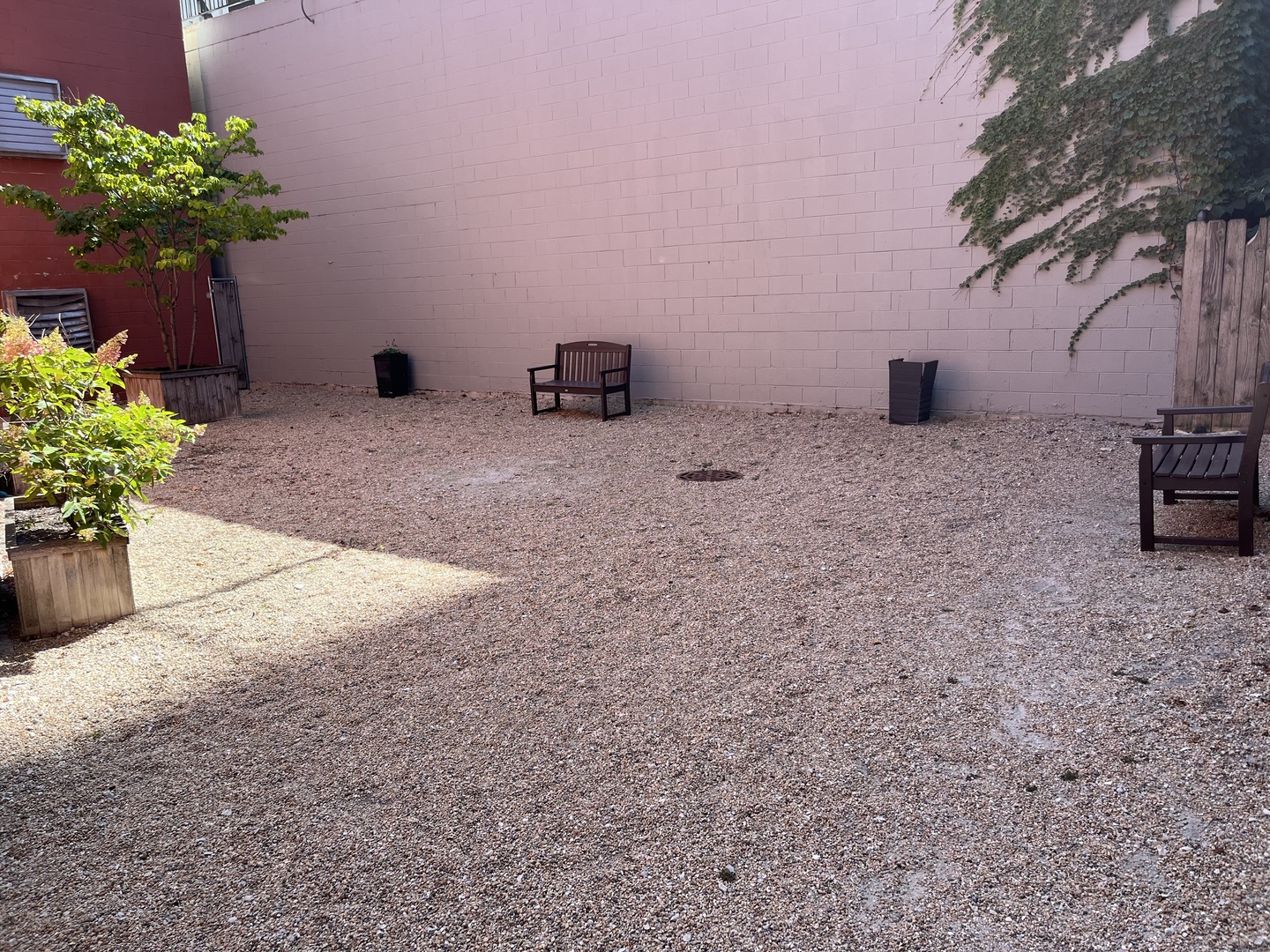 211 West Scott Street, Unit 508 Chicago, IL 60610 - Photo 22 of 22 a view of a backyard with a chair and a potted plant