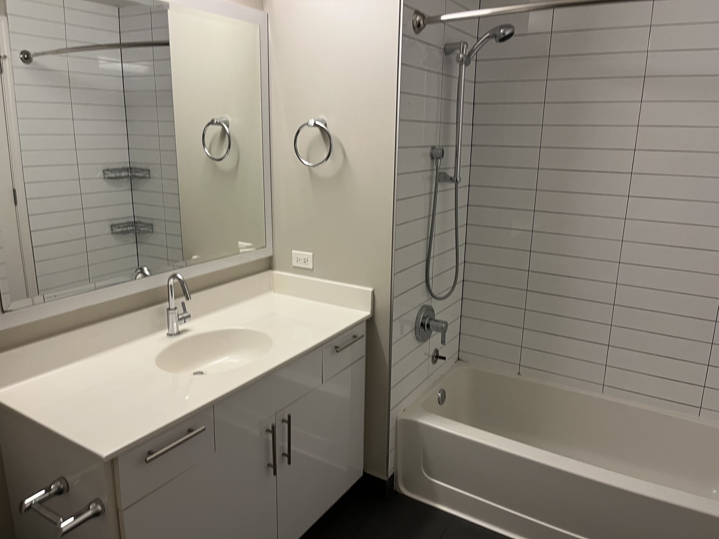 211 West Scott Street, Unit 508 Chicago, IL 60610 - Photo 5 of 22 a bathroom with a sink and a bathtub