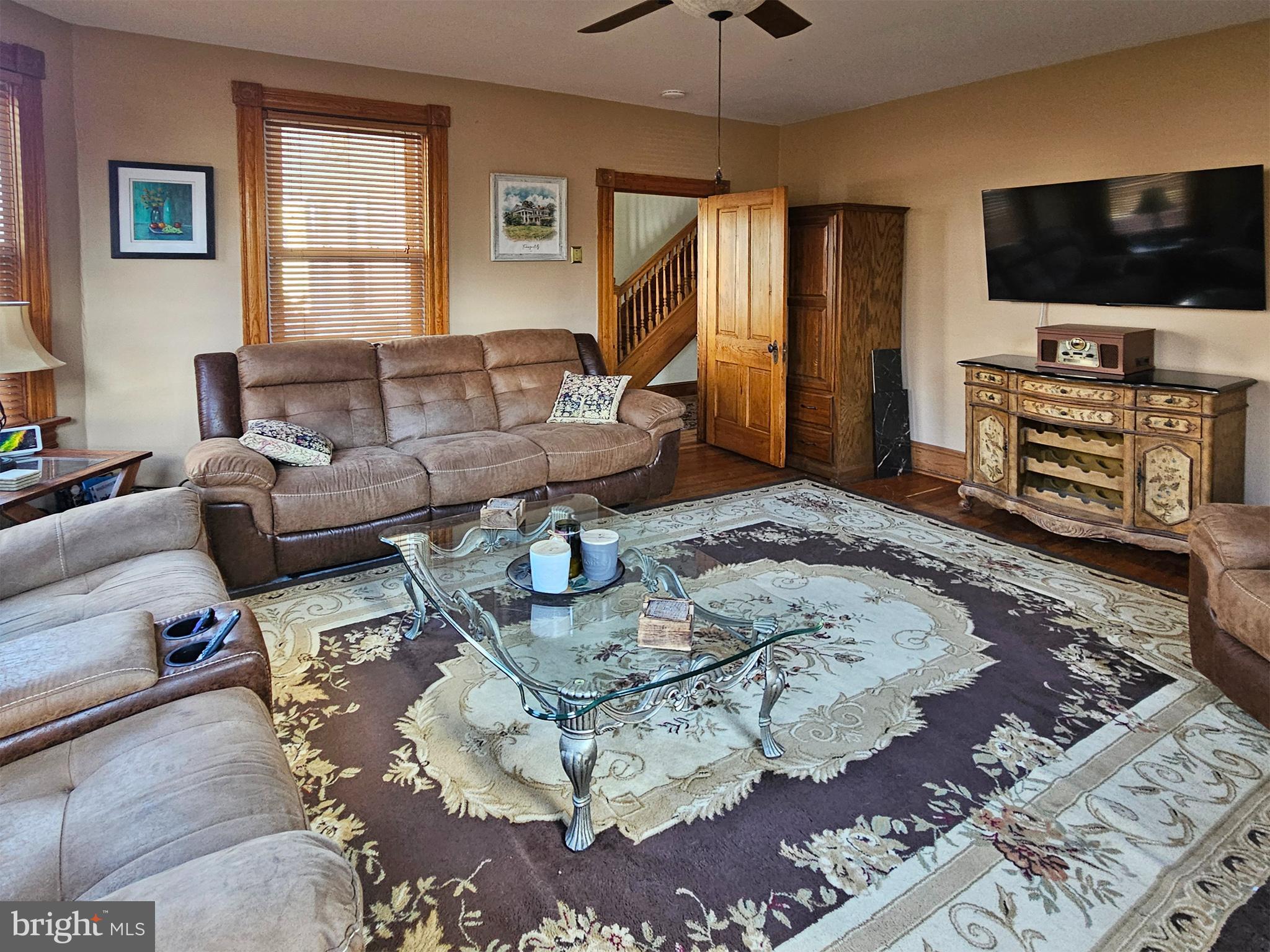 20 Blue Ridge Avenue Front Royal, VA 22630 - Photo 13 of 51 a living room with furniture and a flat screen tv