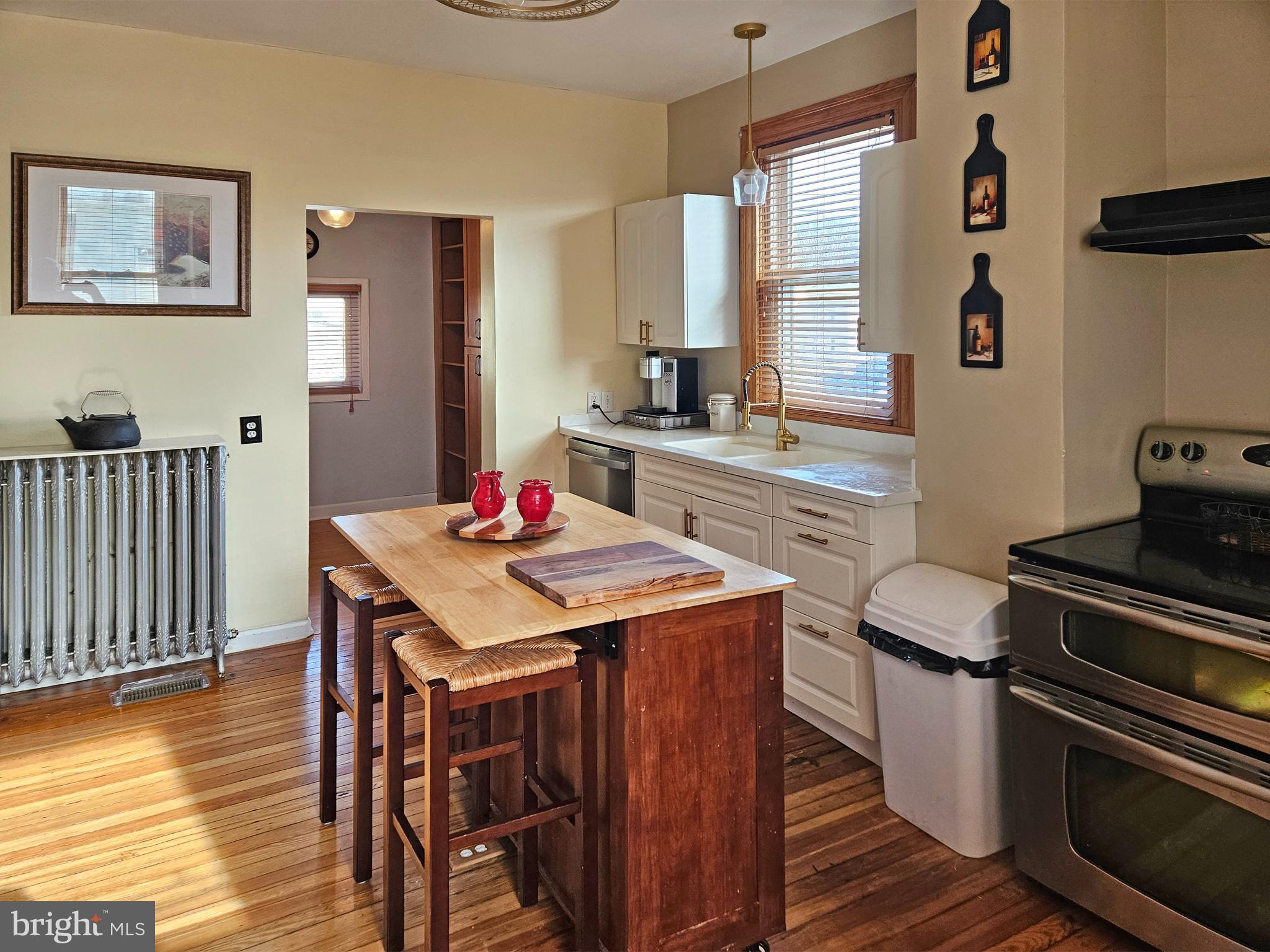 20 Blue Ridge Avenue Front Royal, VA 22630 - Photo 22 of 51 a kitchen with a stove a sink and a refrigerator