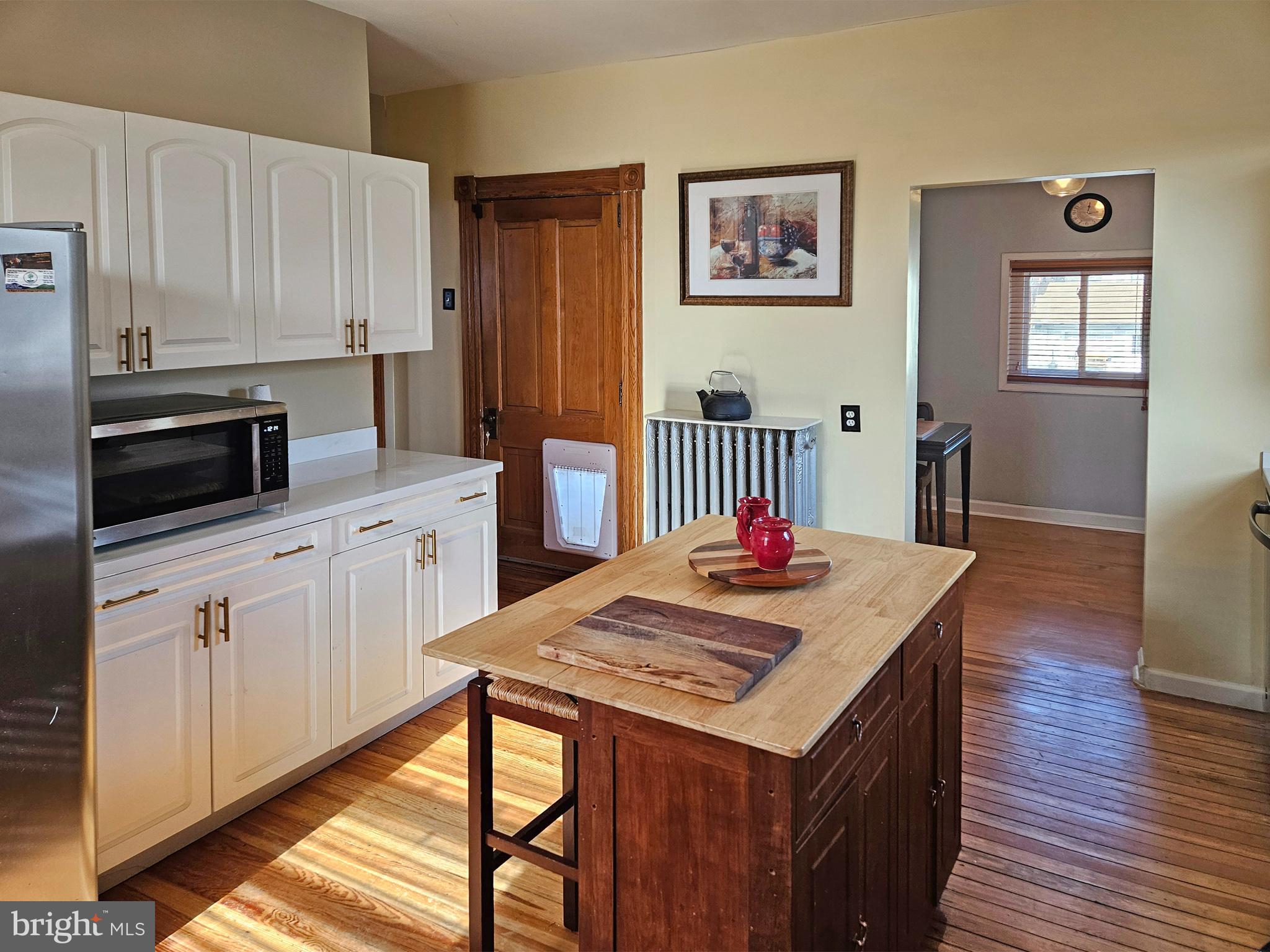 20 Blue Ridge Avenue Front Royal, VA 22630 - Photo 23 of 51 a kitchen that has a microwave a sink and a stove in it
