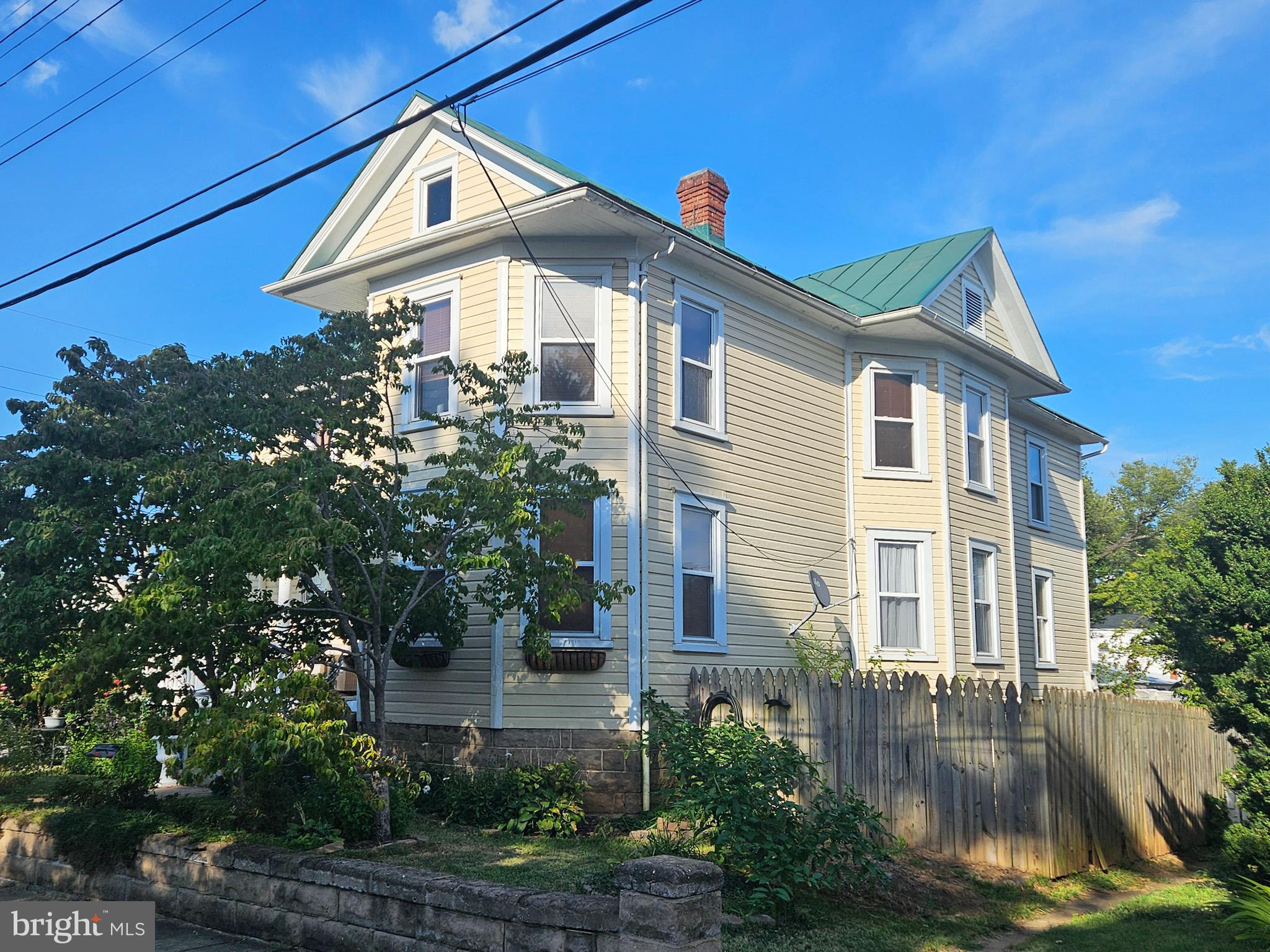 20 Blue Ridge Avenue Front Royal, VA 22630 - Photo 3 of 51 a front view of a house with a yard