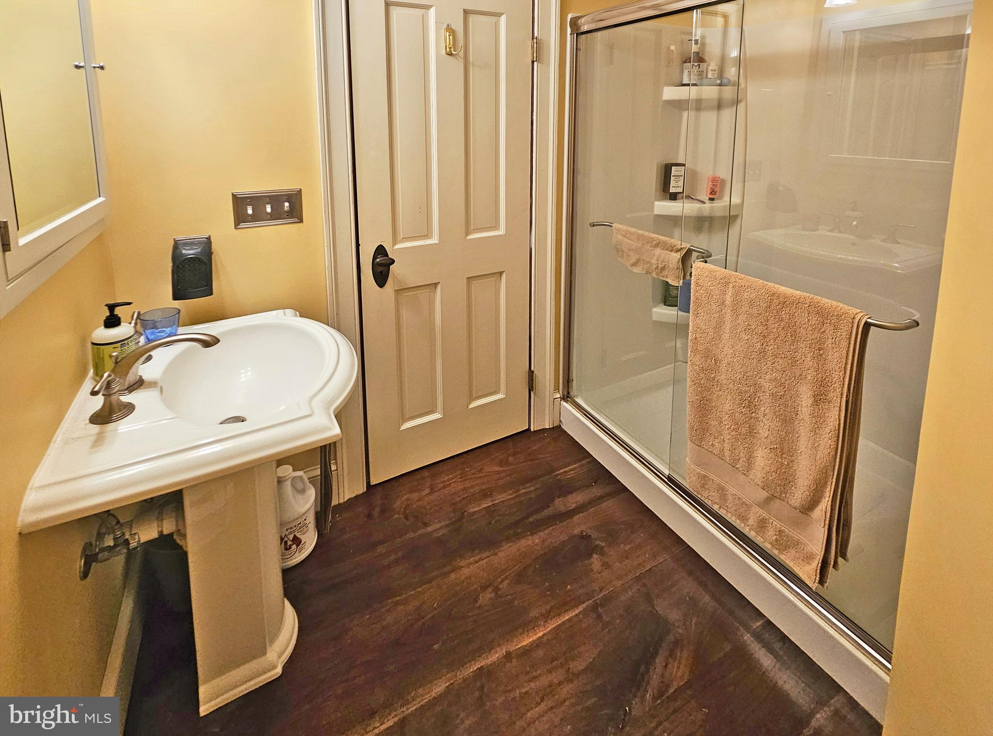 20 Blue Ridge Avenue Front Royal, VA 22630 - Photo 34 of 51 a bathroom with a sink a toilet and shower