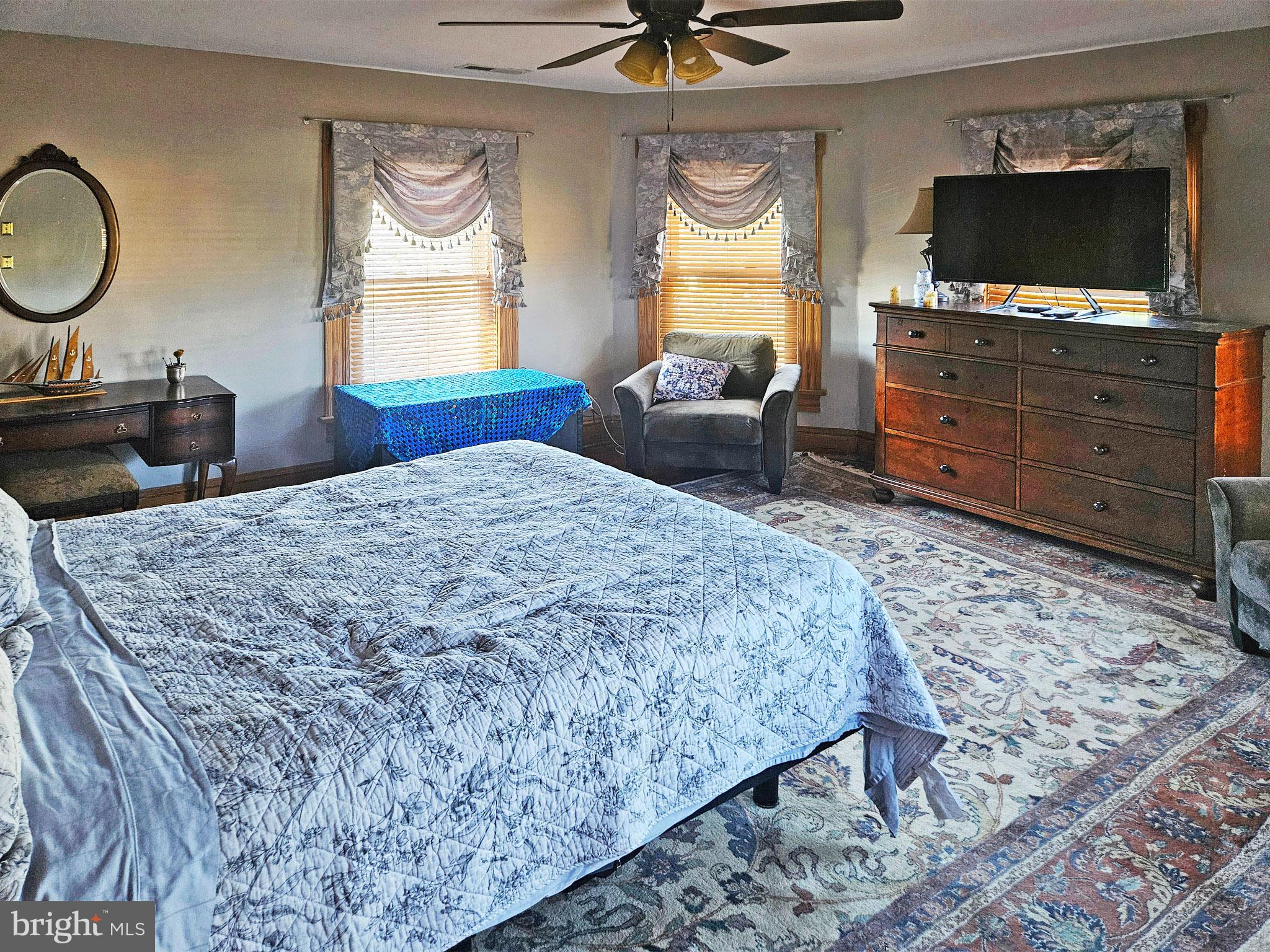 20 Blue Ridge Avenue Front Royal, VA 22630 - Photo 35 of 51 a bedroom with a bed and a television