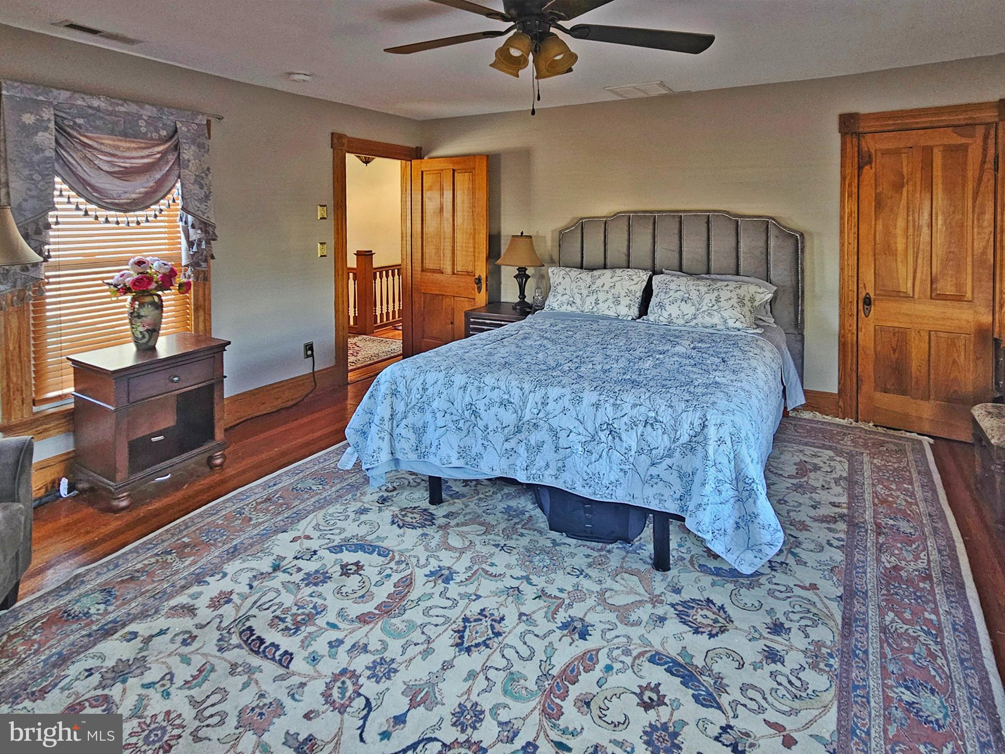 20 Blue Ridge Avenue Front Royal, VA 22630 - Photo 37 of 51 a bed sitting in a bedroom next to a window