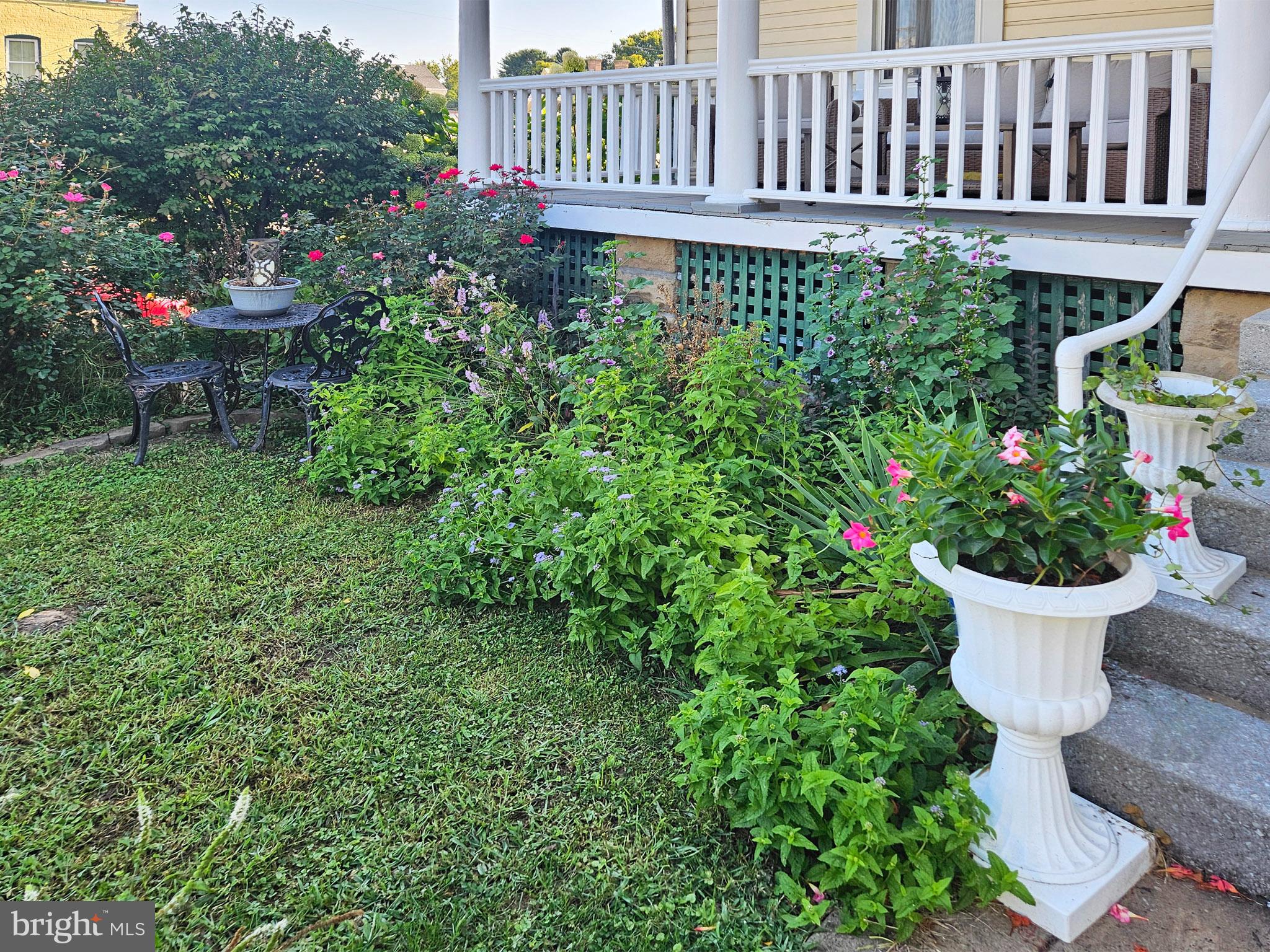 20 Blue Ridge Avenue Front Royal, VA 22630 - Photo 4 of 51 a view of a house with a flower garden