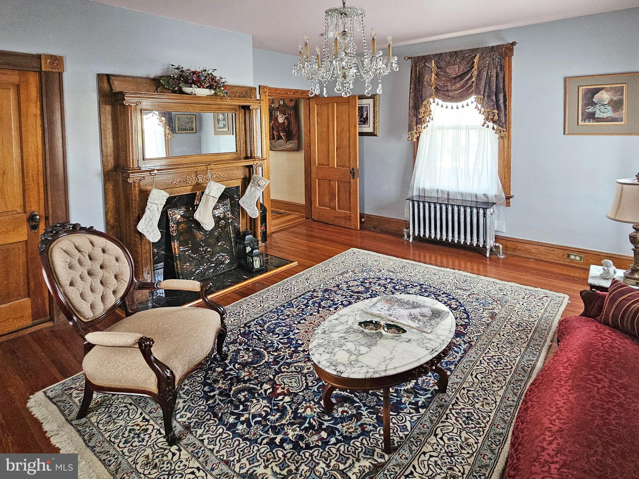 20 Blue Ridge Avenue Front Royal, VA 22630 - Photo 9 of 51 a view of a livingroom with furniture and a chandelier