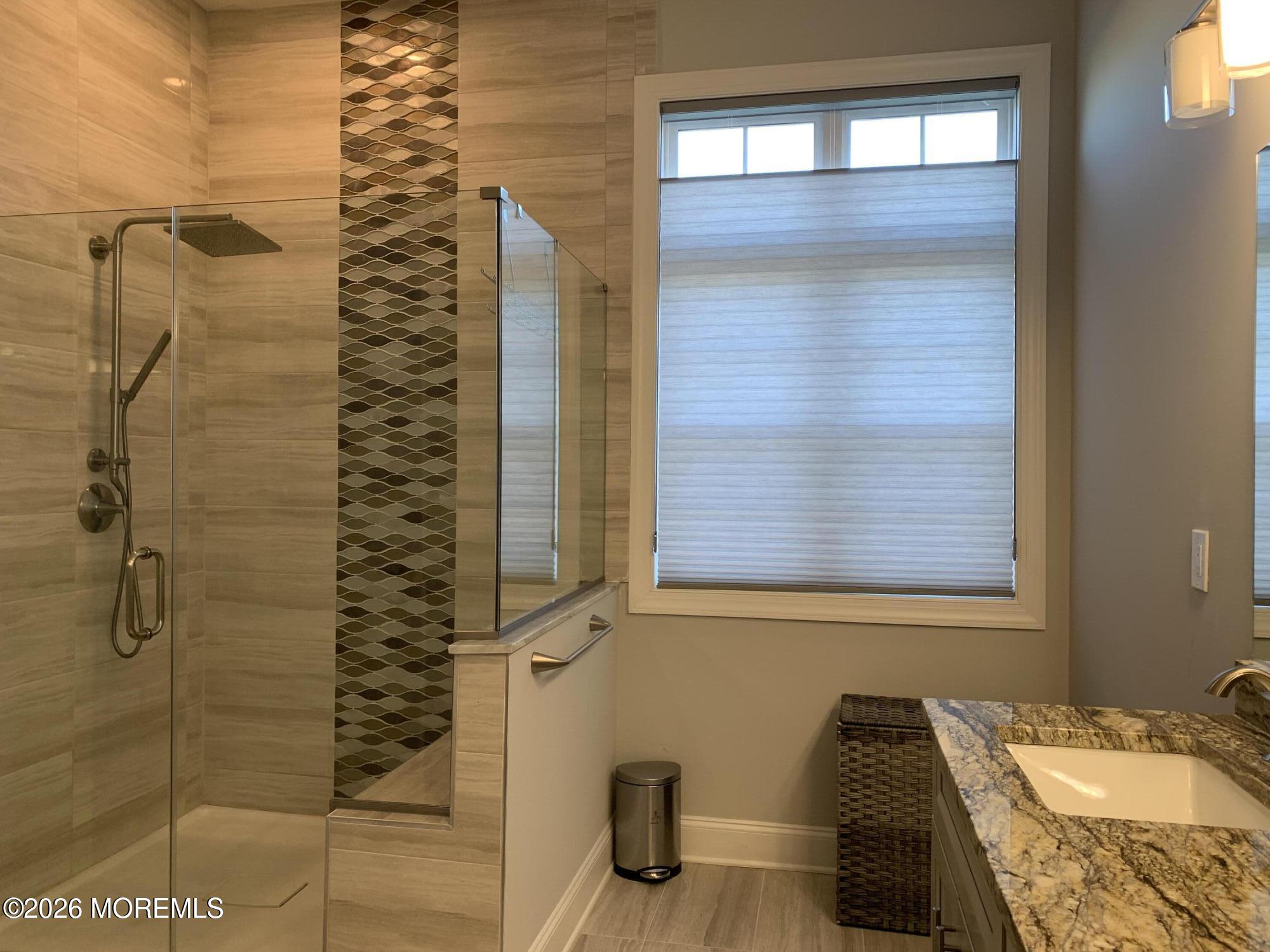 67 Samjan Circle Hightstown, NJ 08520 - Photo 11 of 22 a bathroom with a granite countertop shower and a sink