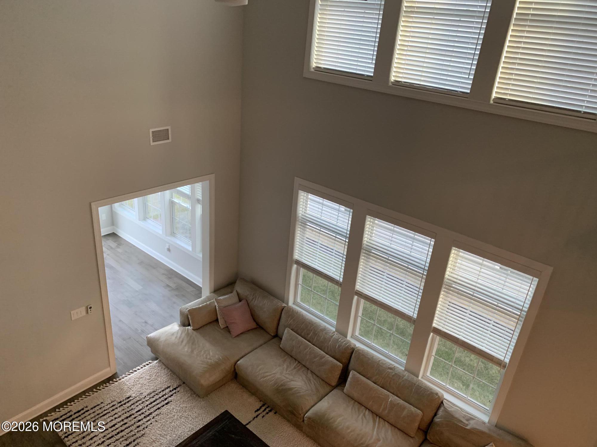 67 Samjan Circle Hightstown, NJ 08520 - Photo 18 of 22 a living room with furniture and a window