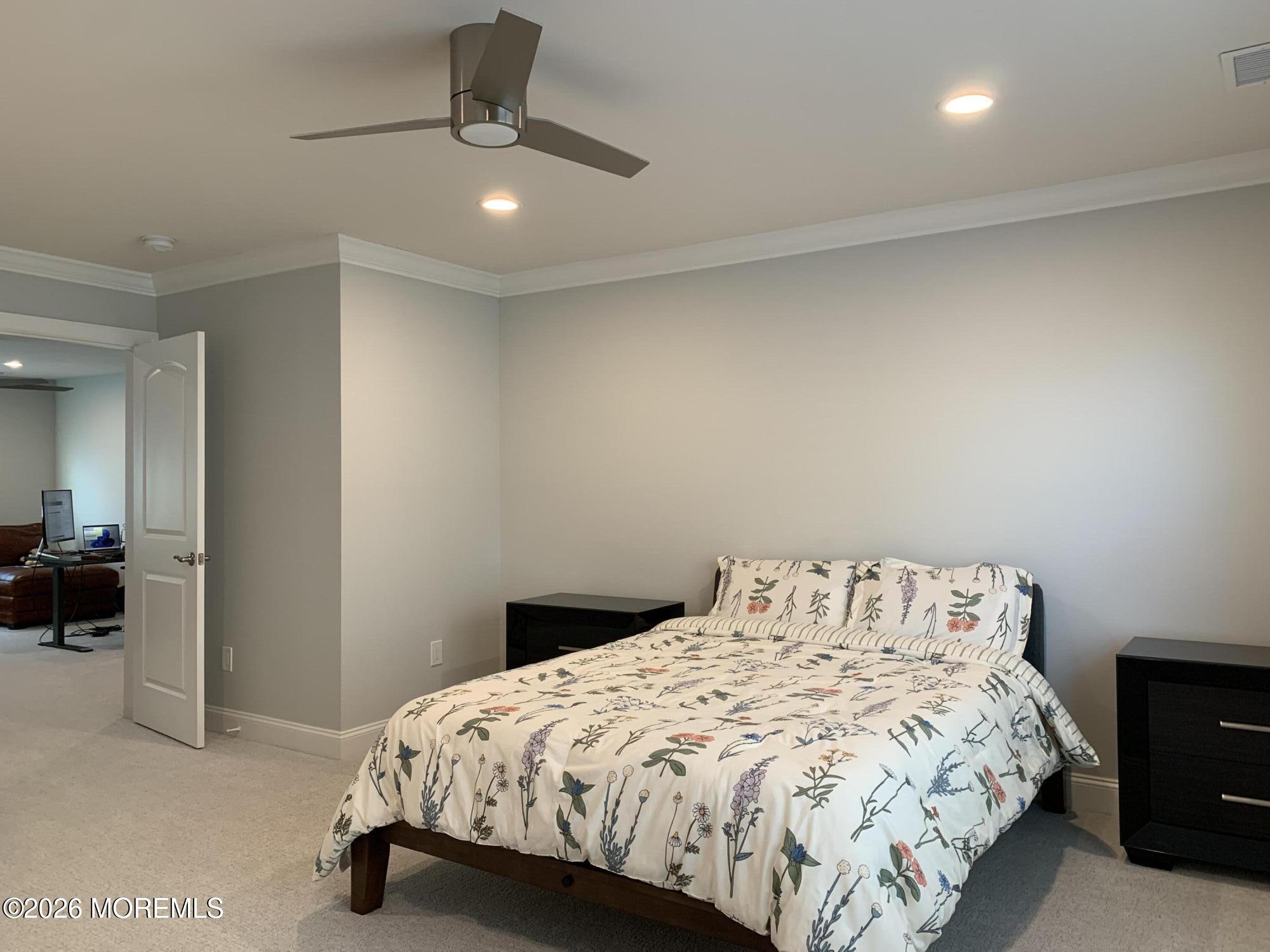 67 Samjan Circle Hightstown, NJ 08520 - Photo 19 of 22 a bedroom with a bed and a night stand